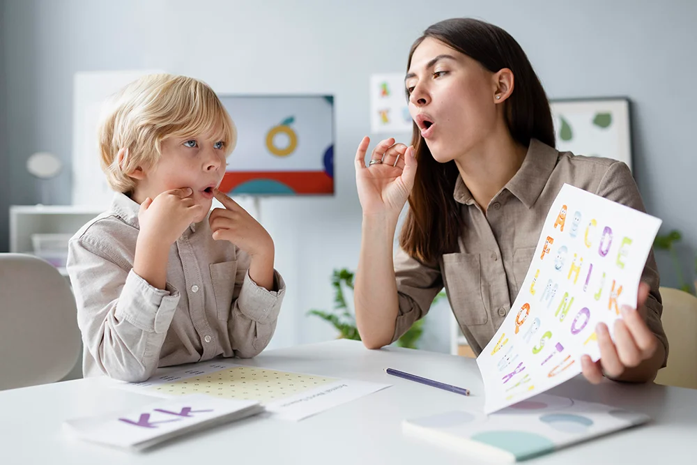 Speech therapist working with a child.